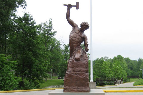 Bronze sculpture Man carving himself out of stone self made man statue for sale